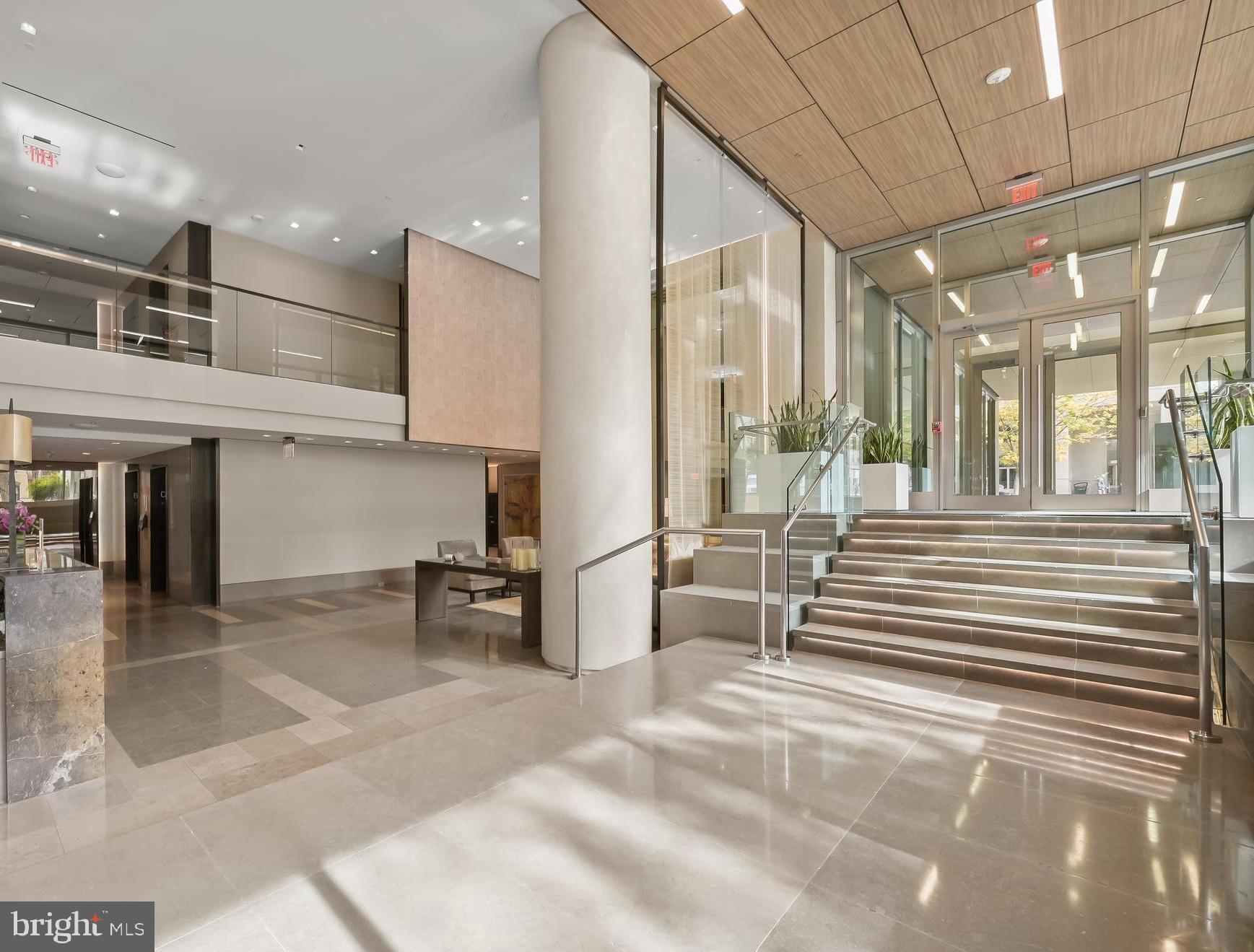 2501 M Street Northwest, Unit 612 Washington, DC 20037 - Photo 32 of 44 a lobby with furniture and a rug