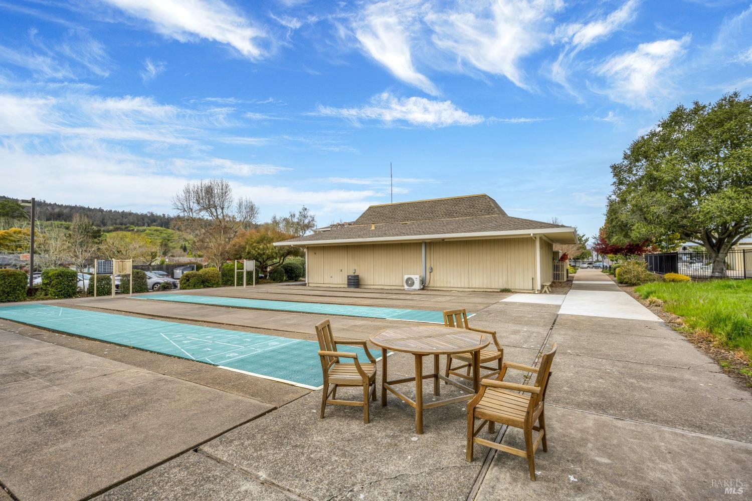 23 Valley Green Street Santa Rosa, CA 95409 - Photo 40 of 58 a view of a terrace with a table and chairs