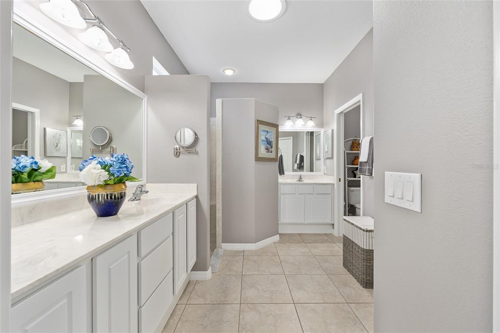 16339 Southwest 14th Avenue Road Ocala, FL 34473 - Photo 13 of 22 a kitchen with a sink and refrigerator