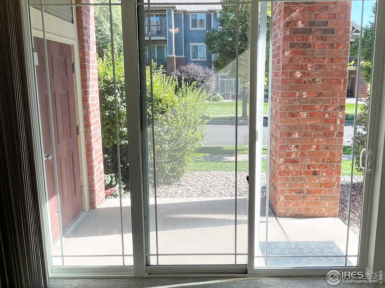 2133 Krisron Road, Unit 103 Fort Collins, CO 80525 - Photo 15 of 26 Patio facing north on Krisron RD