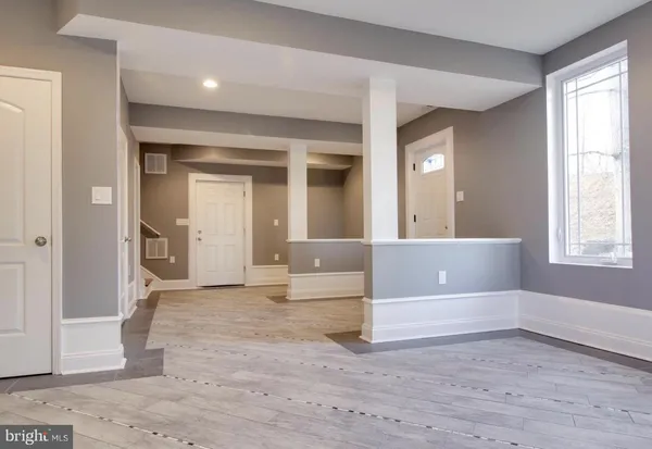 wooden floor and window in a room
