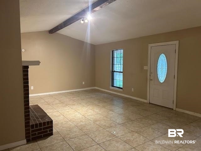 15602 Wrangler Road Summerdale, AL 36580 - Photo 6 of 14 Entrance foyer featuring light tile patterned flooring and a fireplace