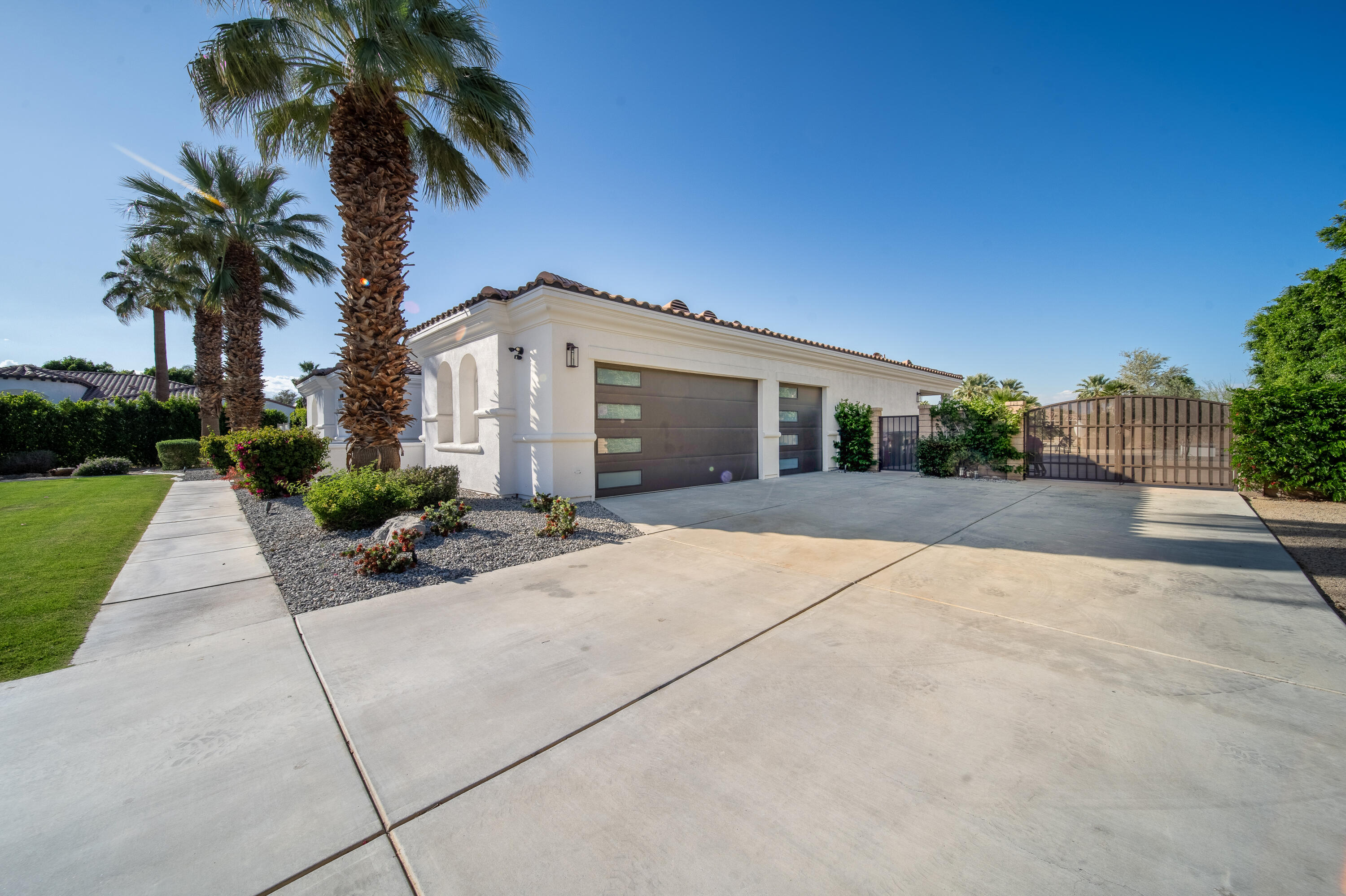 80262 Amazon Avenue Indio, CA 92201 - Photo 6 of 69 a front view of house with yard and green space