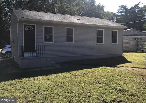 a view of a backyard of the house
