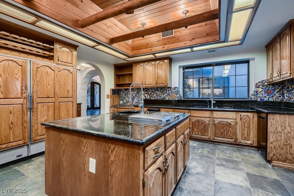 1 Quail Run Road Henderson, NV 89014 - Photo 19 of 82 Island with sink, 4 burner range, built-in deep fryer