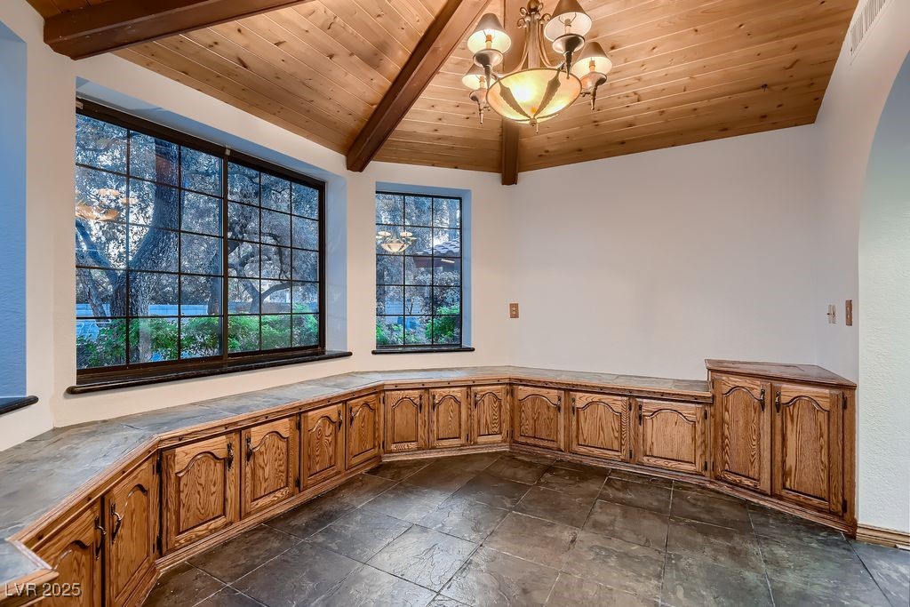 1 Quail Run Road Henderson, NV 89014 - Photo 22 of 82 Kitchen dining area with a view of the pool area