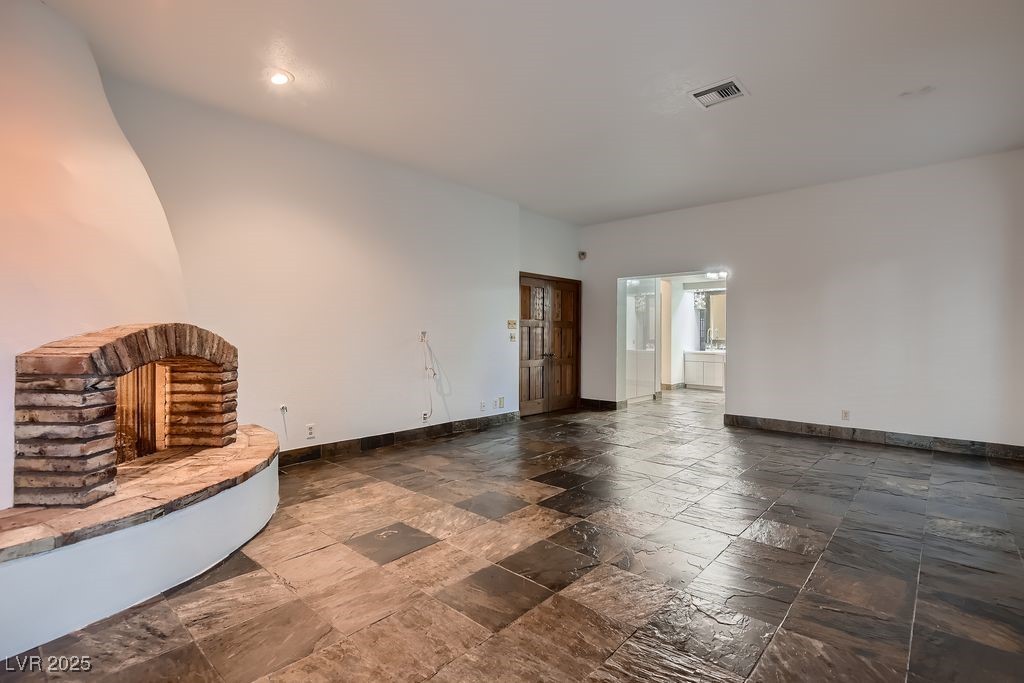 1 Quail Run Road Henderson, NV 89014 - Photo 31 of 82 Wood burning fireplace now equipped with gas log