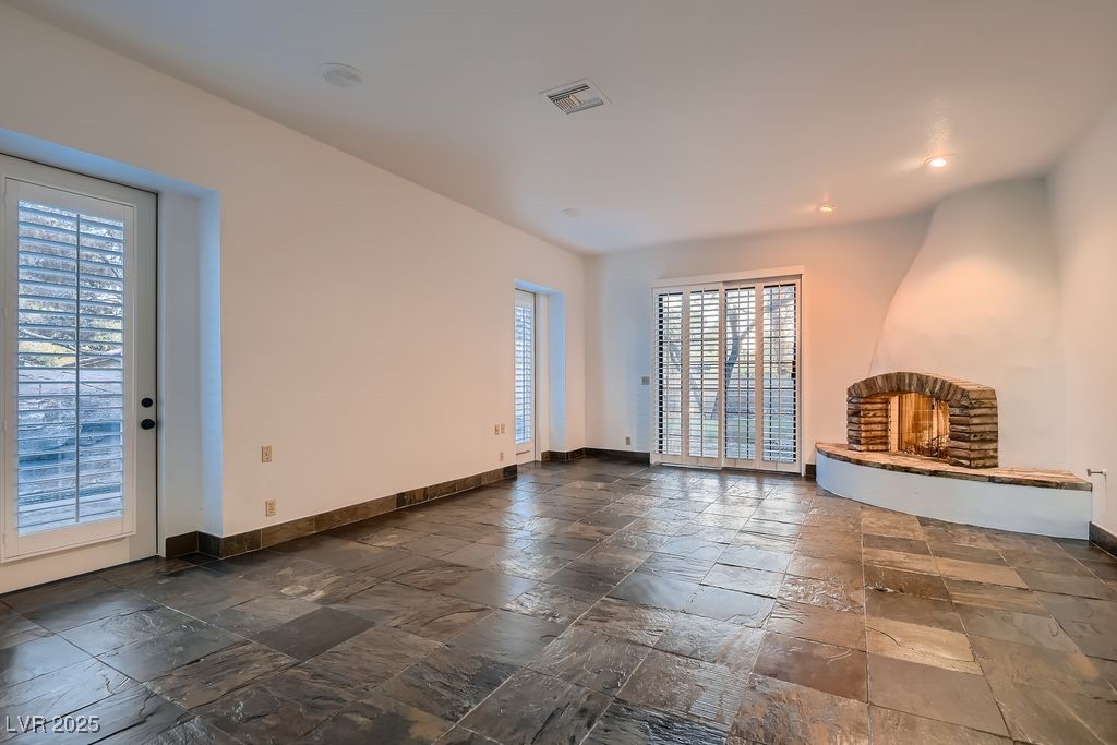 1 Quail Run Road Henderson, NV 89014 - Photo 32 of 82 Dual doors and slider provide access to the large Koi pond and patio