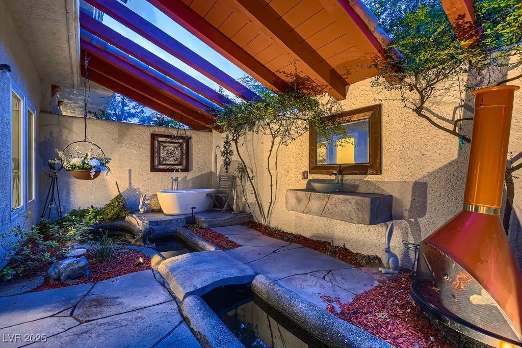 1 Quail Run Road Henderson, NV 89014 - Photo 40 of 82 Outside tub garden and Koi pond