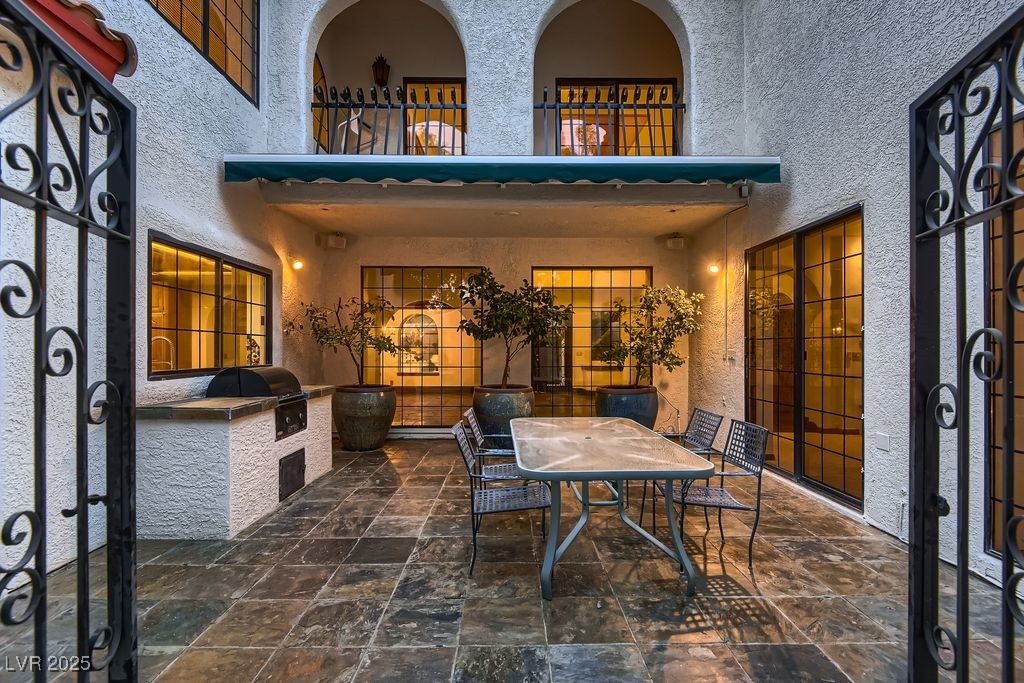 1 Quail Run Road Henderson, NV 89014 - Photo 52 of 82 Rear courtyard patio with motorized retractable awning and built-in BBQ