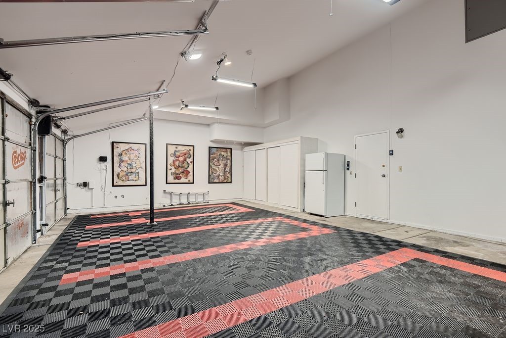 1 Quail Run Road Henderson, NV 89014 - Photo 57 of 82 Commercial side mount garage door system, snap in flooring