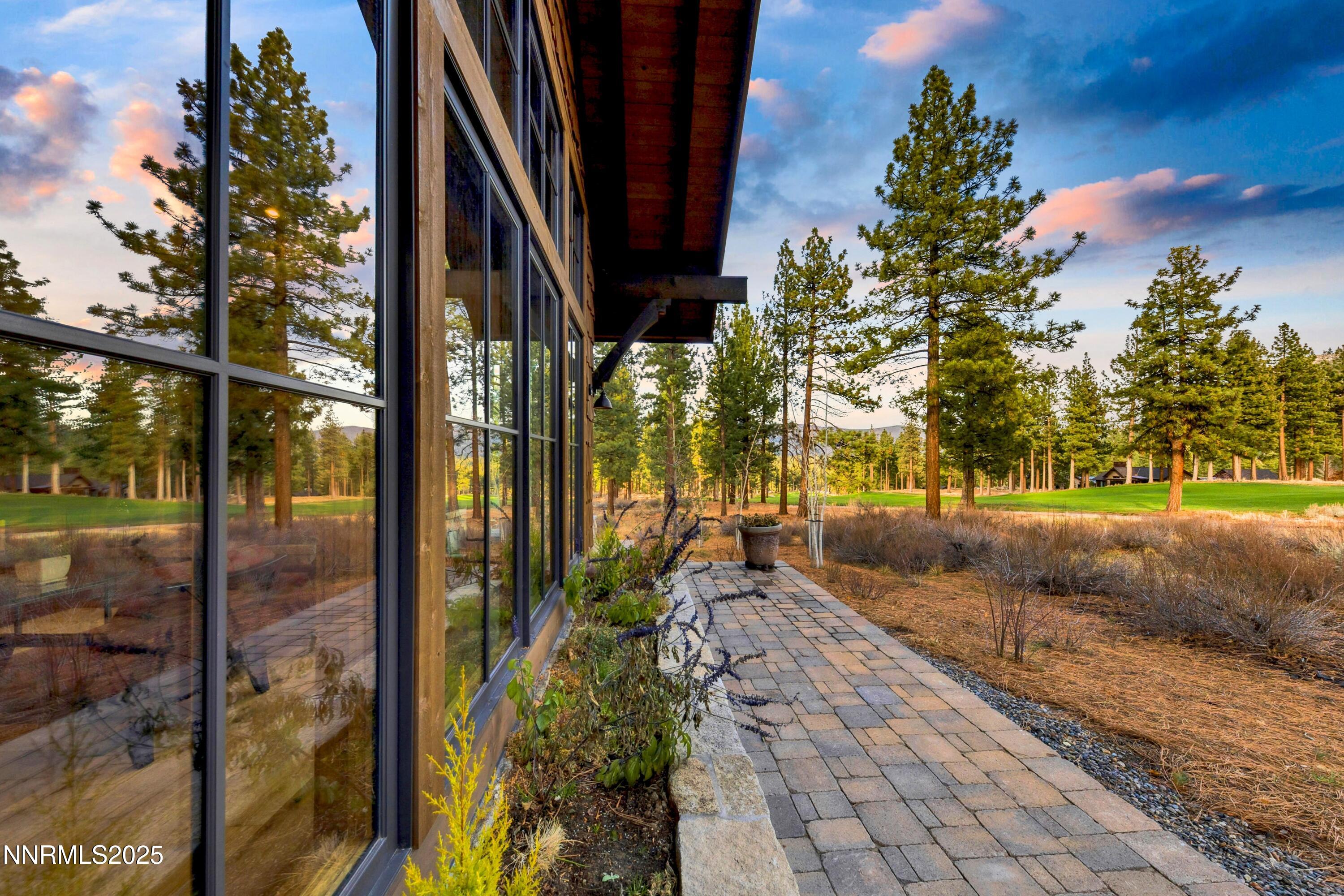 261 Redding Way Carson City, NV 89705 - Photo 2 of 90 a view of a pathway of a house with a yard