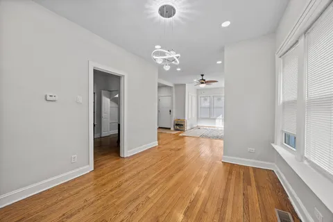 a view of a livingroom with wooden floor