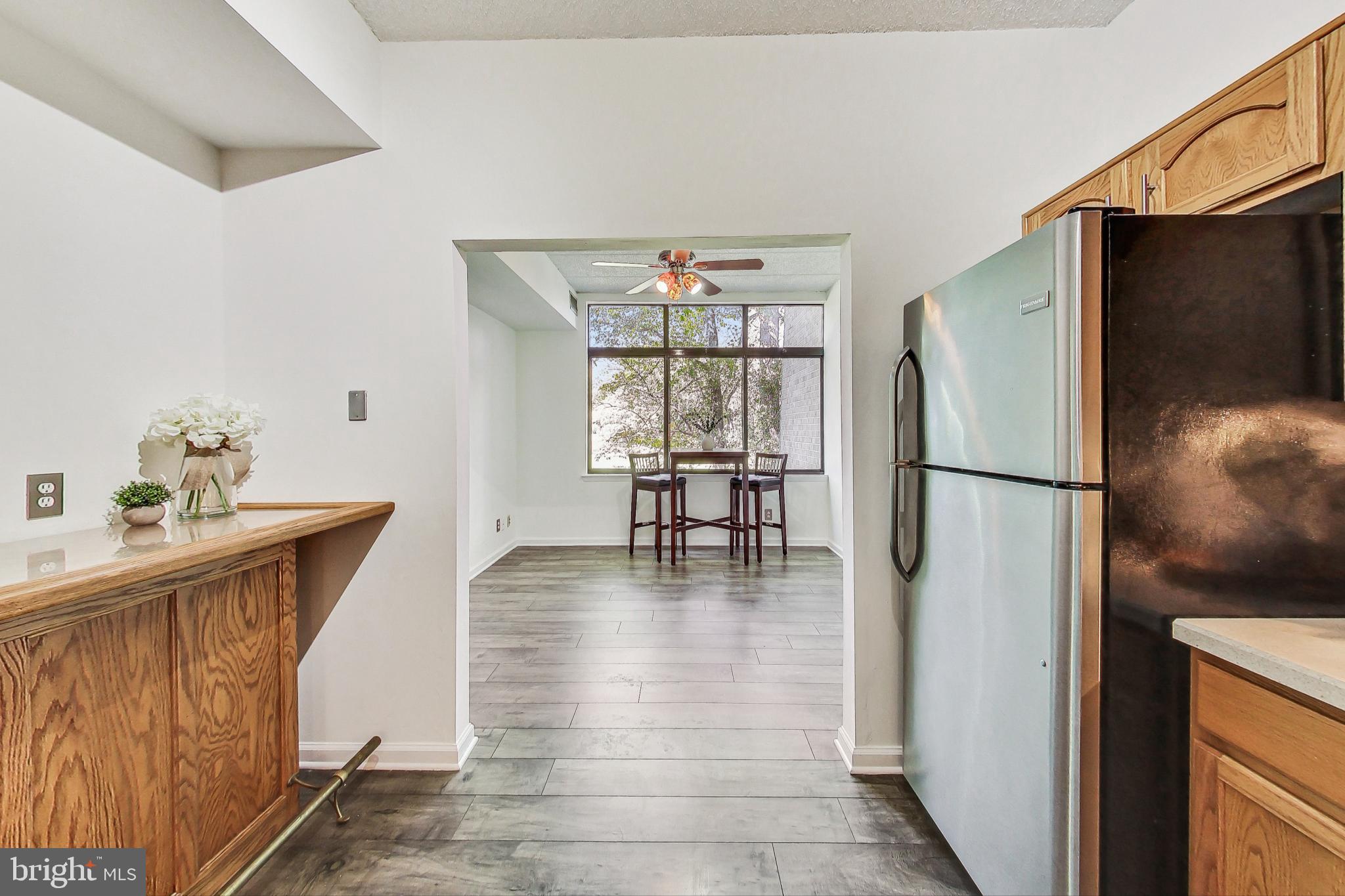 2120 Green Watch Way, Unit 201 Reston, VA 20191 - Photo 12 of 51 Eat-In Kitchen with Laminate Flooring