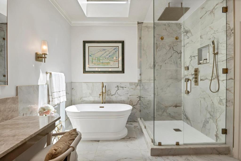 17 Bayhead Lane Osprey, FL 34229 - Photo 18 of 37 a bathroom with a sink and a mirror