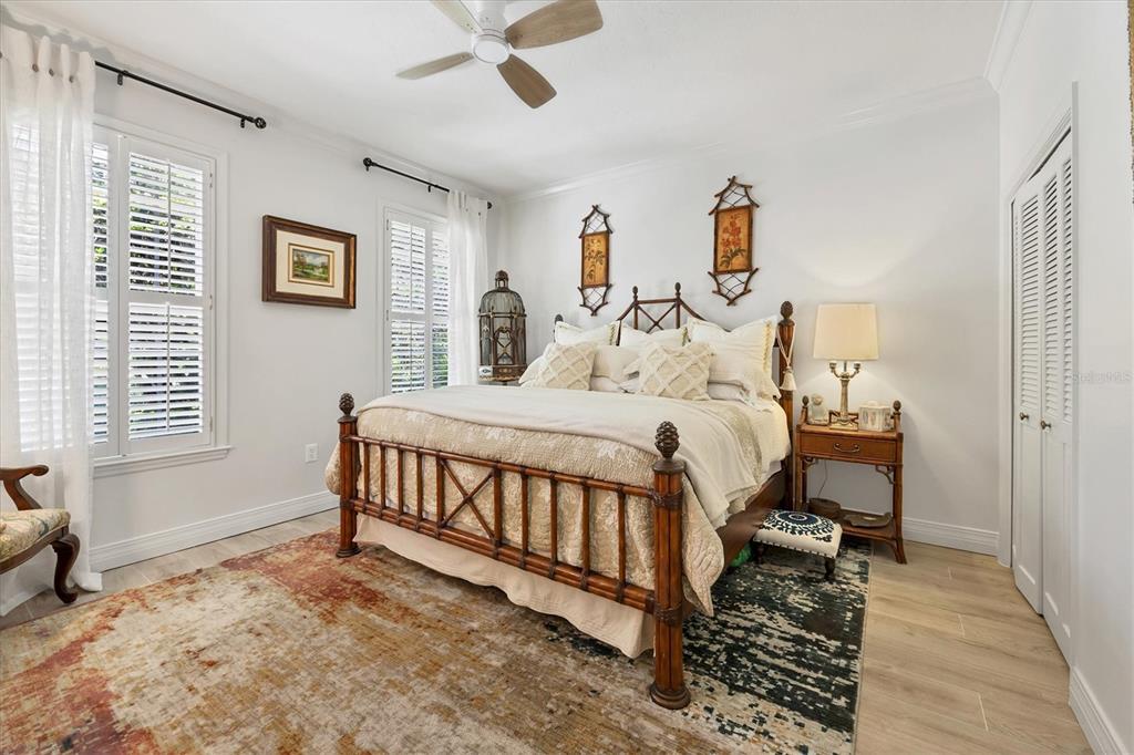 17 Bayhead Lane Osprey, FL 34229 - Photo 20 of 37 a bedroom with a bed and a window