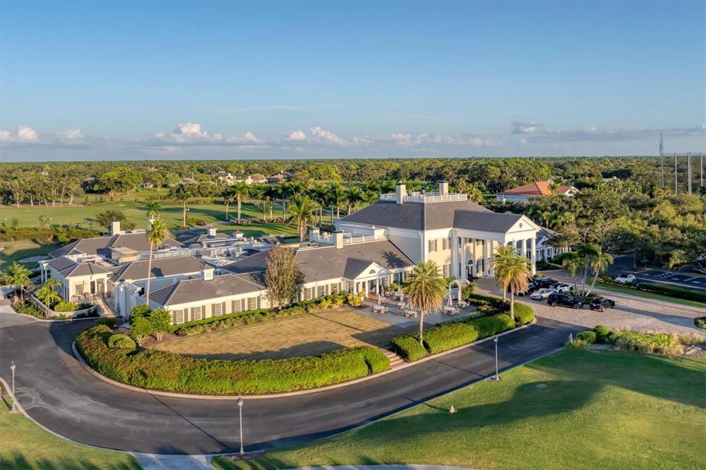 17 Bayhead Lane Osprey, FL 34229 - Photo 40 of 47 a view of a swimming pool with outdoor seating