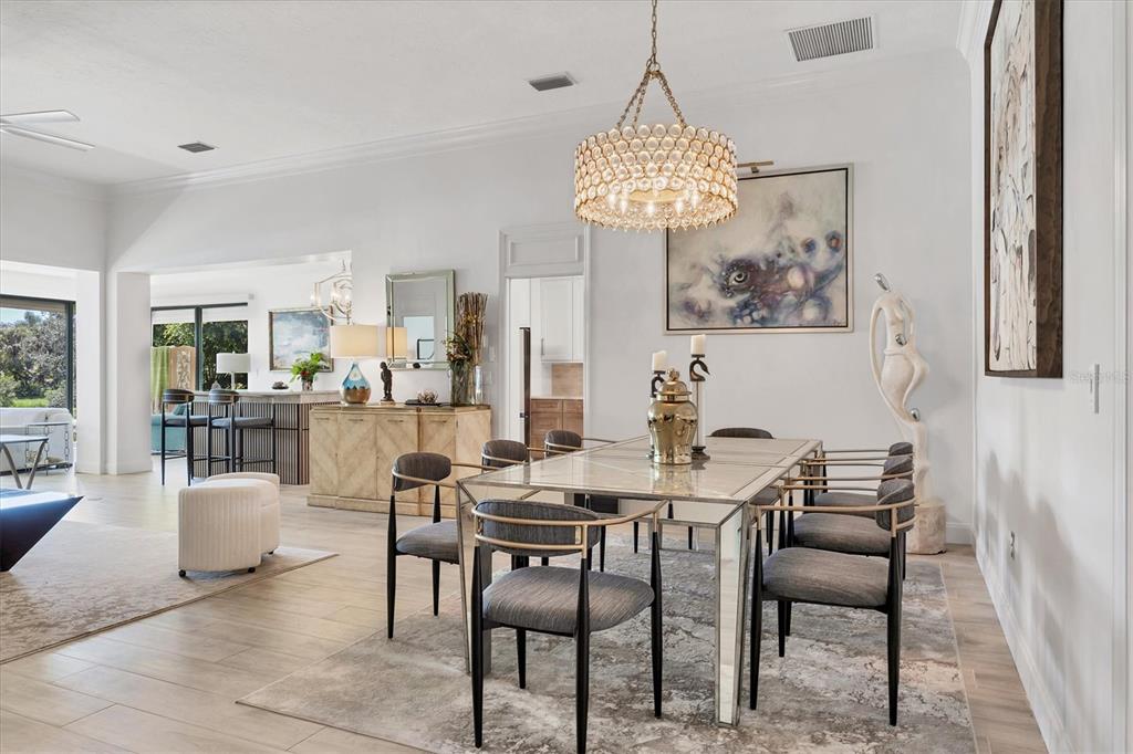 17 Bayhead Lane Osprey, FL 34229 - Photo 4 of 37 a view of a dining room and livingroom view