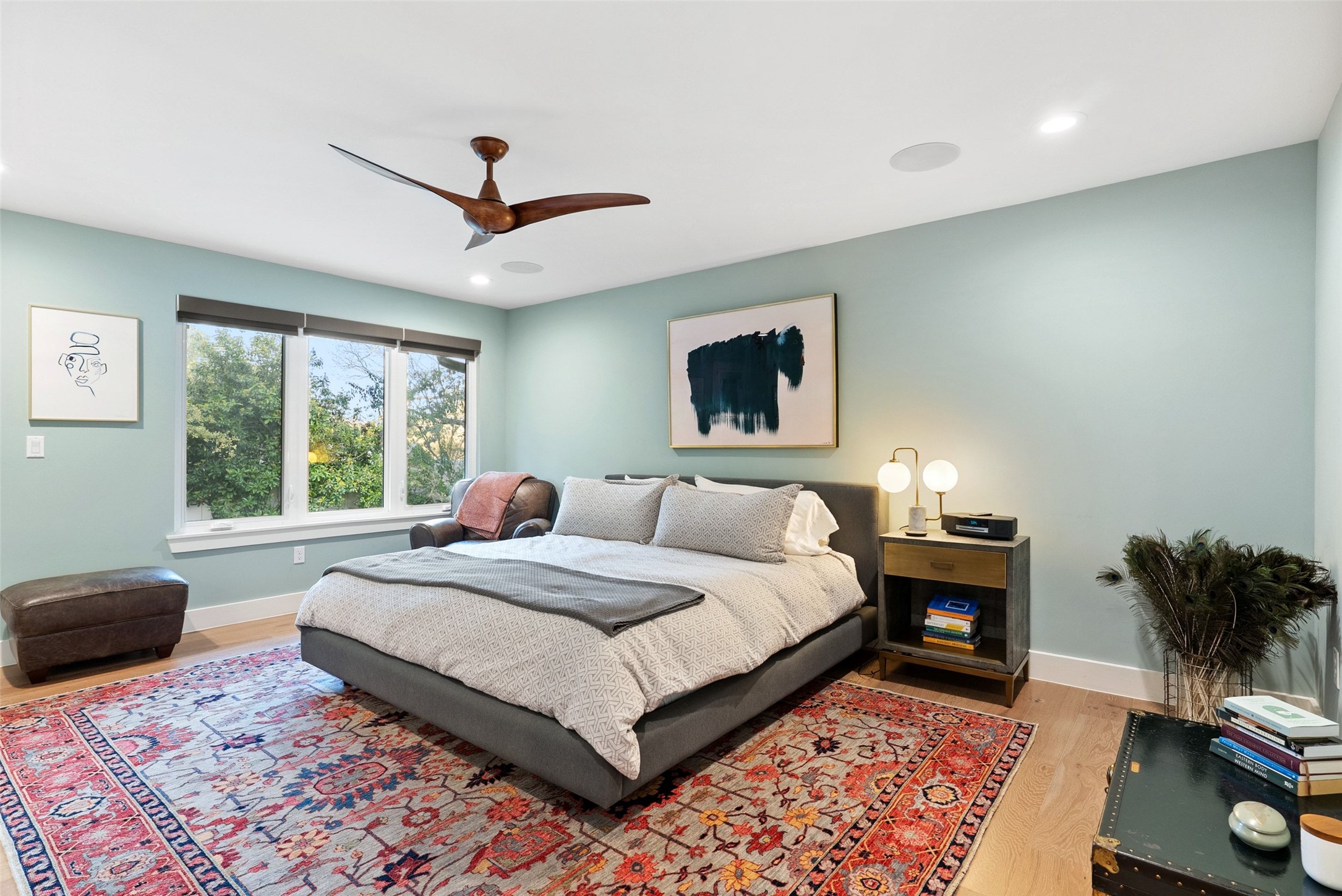 3302 Cherry Tree Circle Austin, TX 78731 - Photo 15 of 37 a bedroom with a large bed and a window