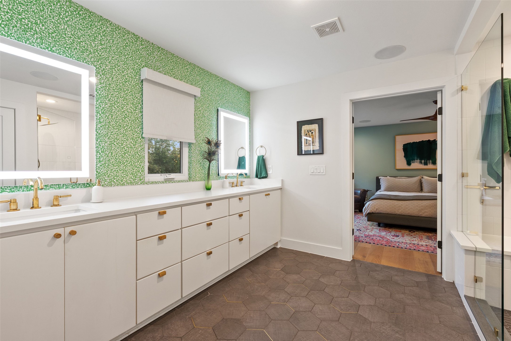 3302 Cherry Tree Circle Austin, TX 78731 - Photo 17 of 37 a en suite bathroom with 2 sink and a mirror