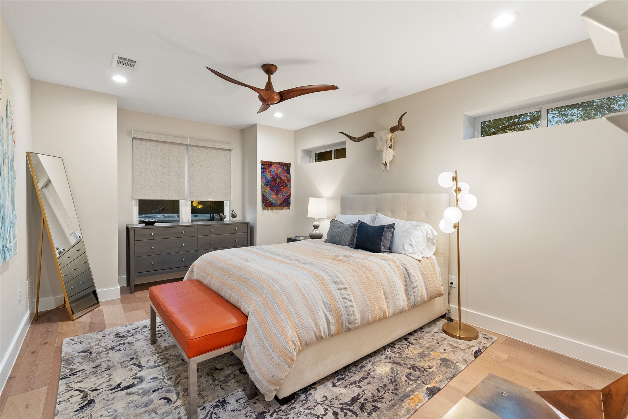 3302 Cherry Tree Circle Austin, TX 78731 - Photo 25 of 37 a bedroom with a bed and a sink