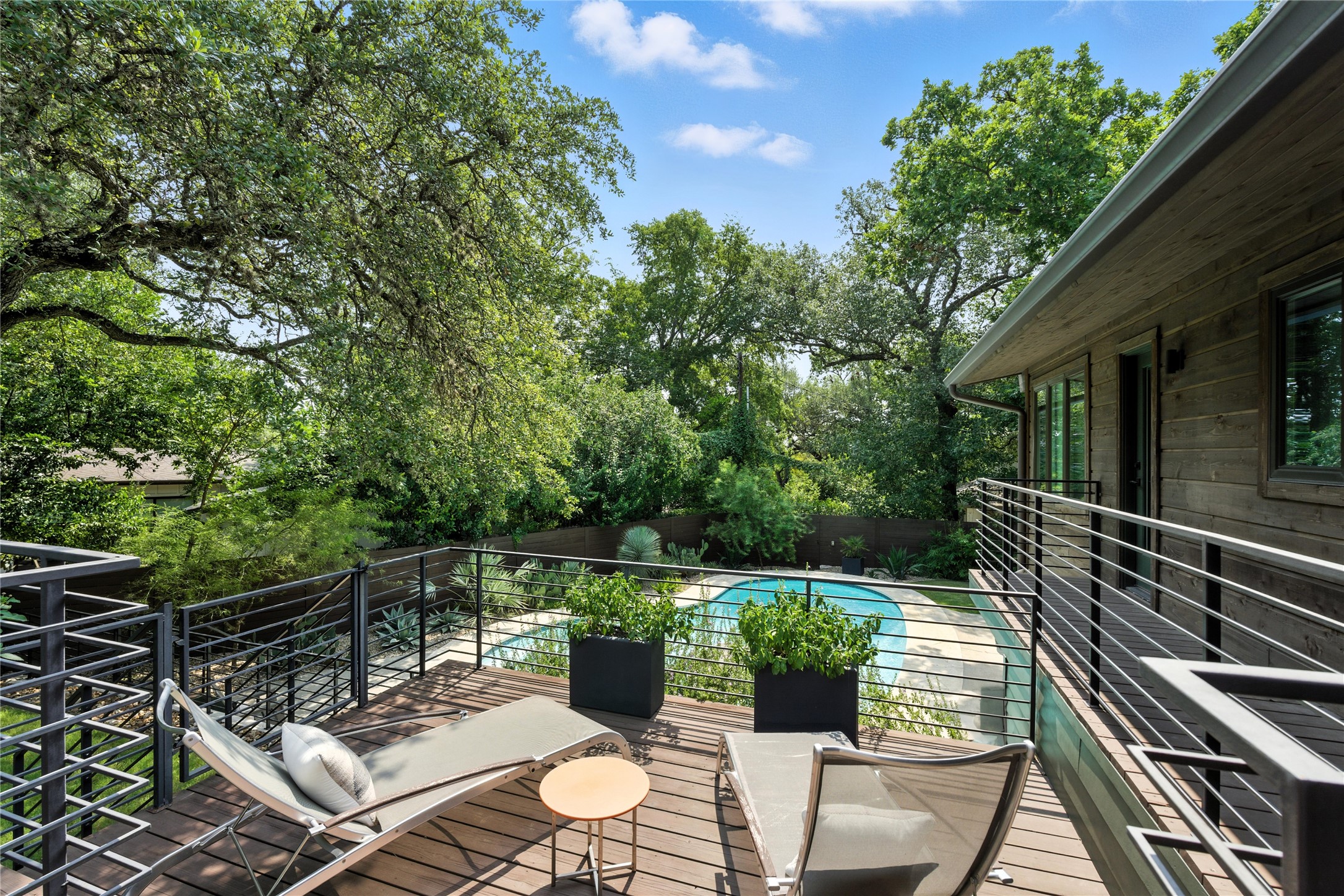 3302 Cherry Tree Circle Austin, TX 78731 - Photo 35 of 37 a view of a chairs and table in the balcony
