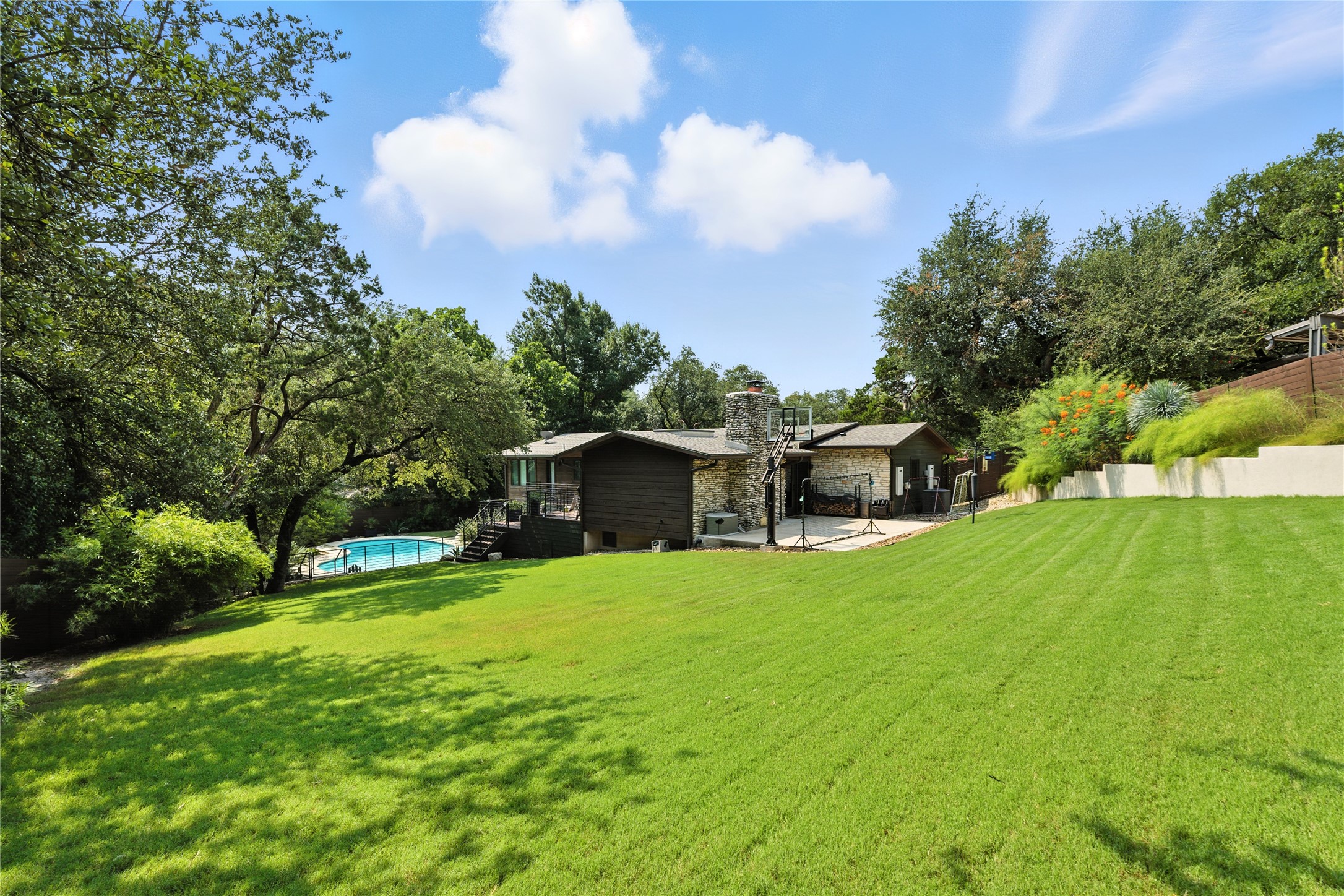 3302 Cherry Tree Circle Austin, TX 78731 - Photo 36 of 37 a view of a house with a yard