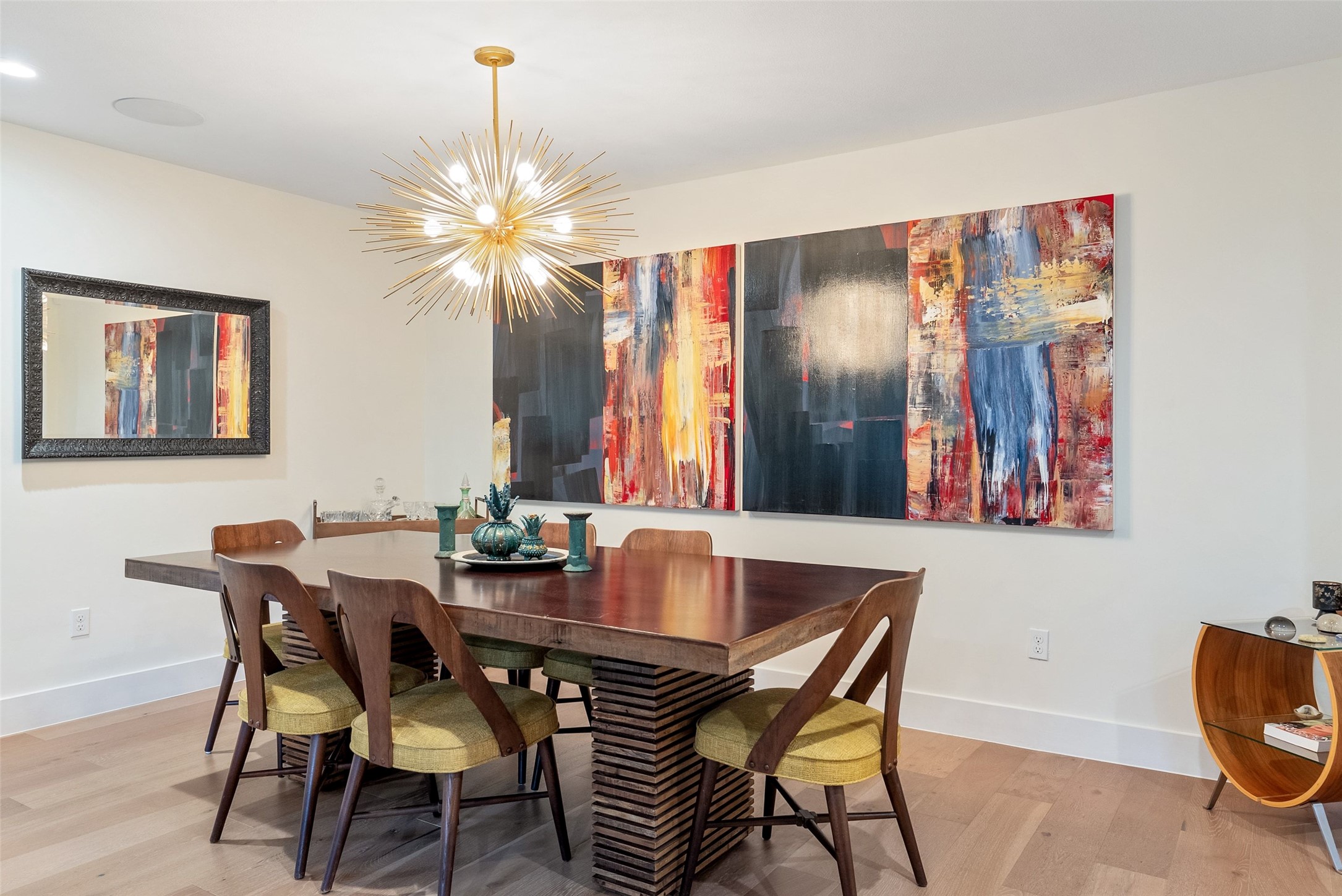 3302 Cherry Tree Circle Austin, TX 78731 - Photo 6 of 37 a dining room with furniture and chandelier