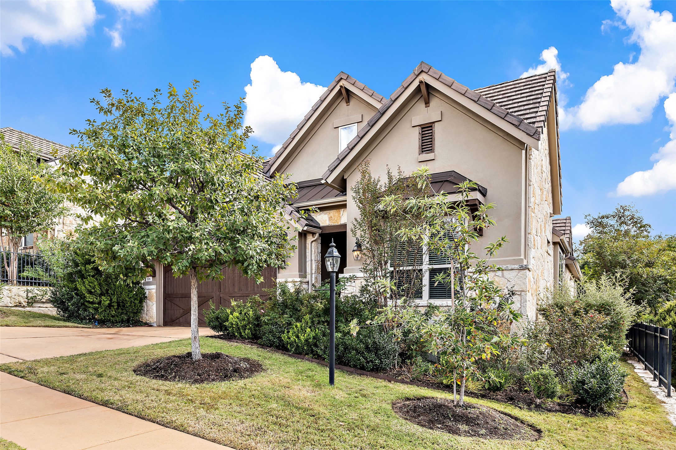 106 Maxwell Way Austin, TX 78738 - Photo 2 of 40 Well maintained front yard