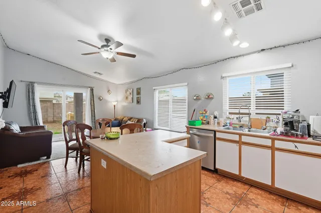 a view of a kitchen and dining room