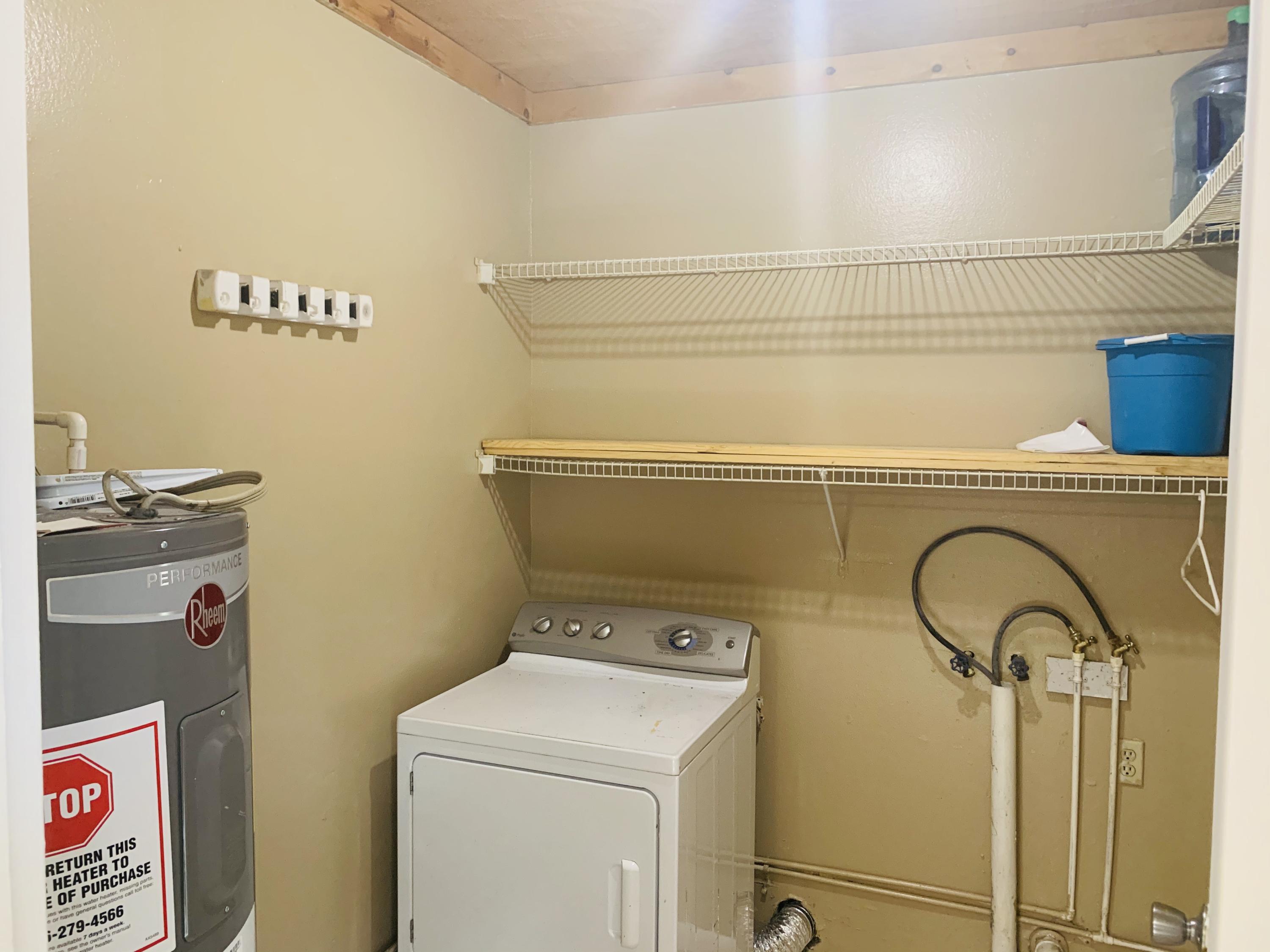 3370 Northwest 40th Drive Okeechobee, FL 34972 - Photo 13 of 14 a utility room with dryer and washer