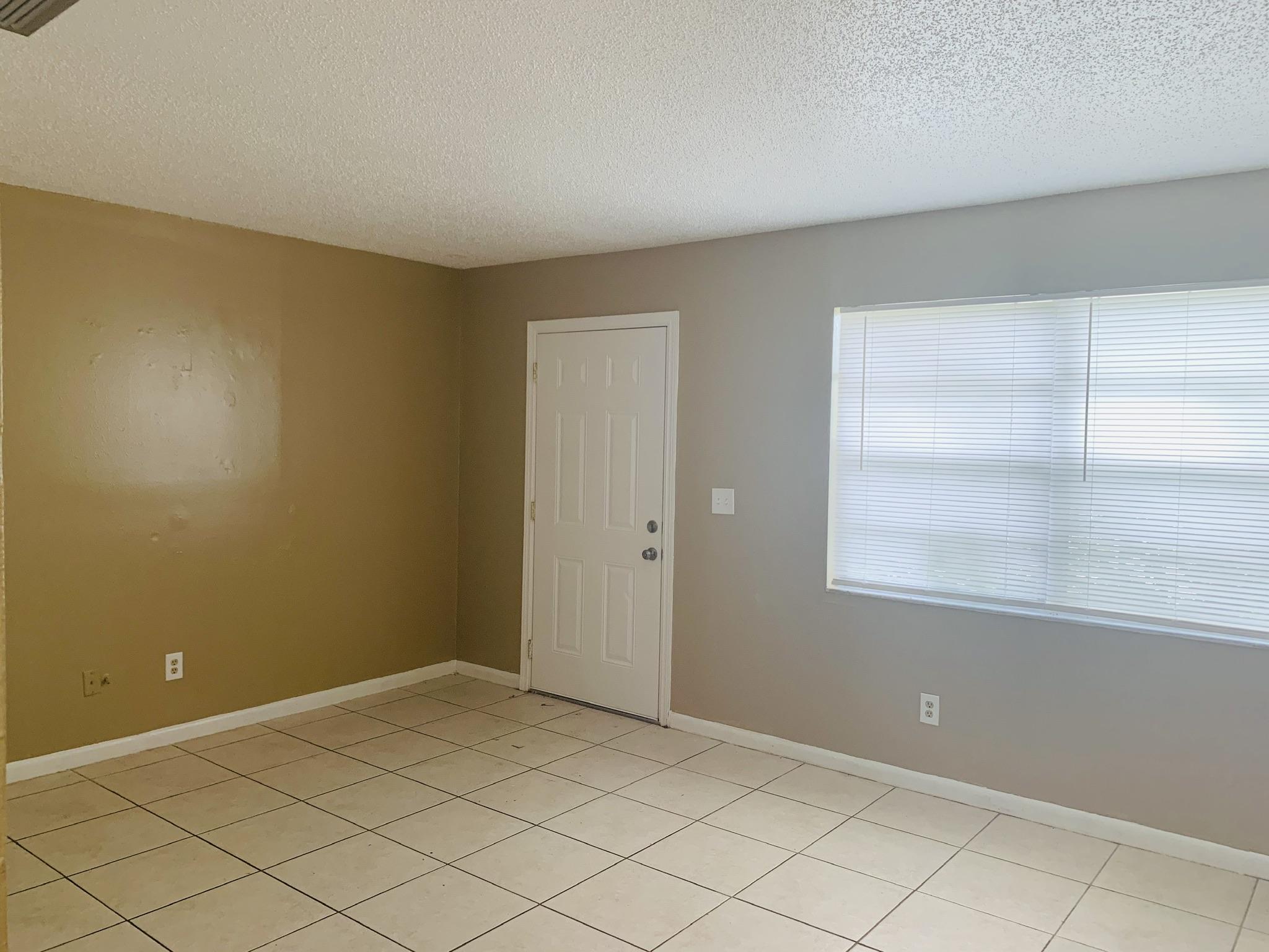3370 Northwest 40th Drive Okeechobee, FL 34972 - Photo 9 of 14 a view of an empty room and window