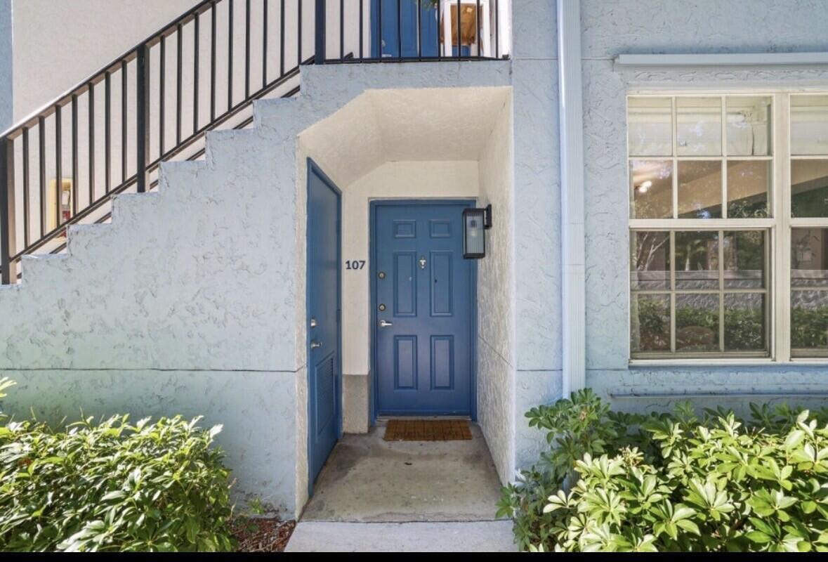 3143 Clint Moore Road, Unit 107 Boca Raton, FL 33496 - Photo 19 of 28 a view of front door of a house