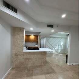 3143 Clint Moore Road, Unit 107 Boca Raton, FL 33496 - Photo 3 of 28 a view of a hallway