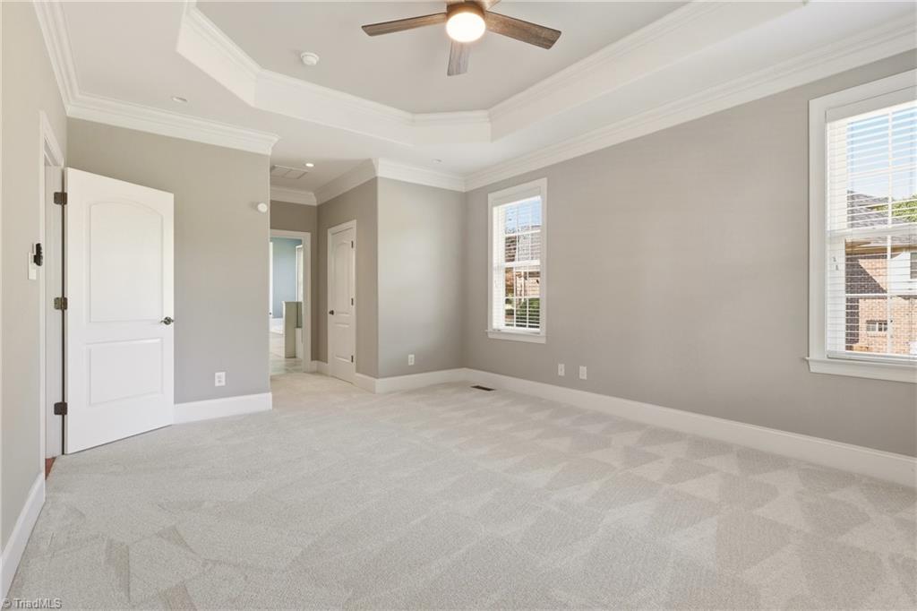 7492 Bethel View Court Oak Ridge, NC 27310 - Photo 21 of 46 Primary Bedroom