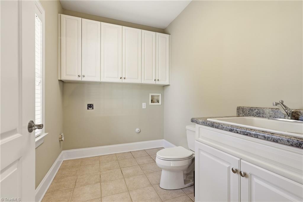 7492 Bethel View Court Oak Ridge, NC 27310 - Photo 33 of 46 Laundry and Half Bath - Main Lever