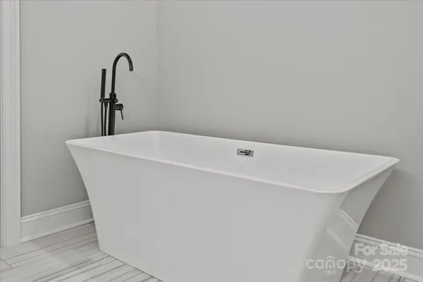 a close up of a bathtub