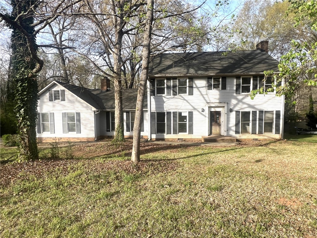 606 Timberlake Road Anderson, SC 29625 - Photo 1 of 12 This classic two-story home features a welcoming facade nestled among mature trees.