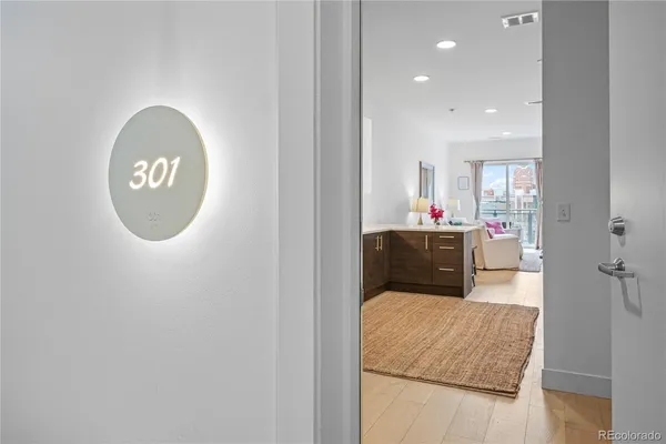 a en suite bathroom with a sink mirror and vanity