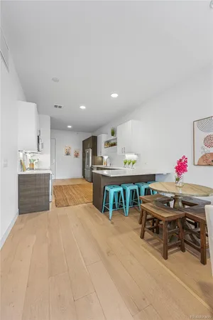 a room with furniture and a flat screen tv
