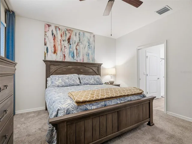 a bathroom with double sink and a mirror
