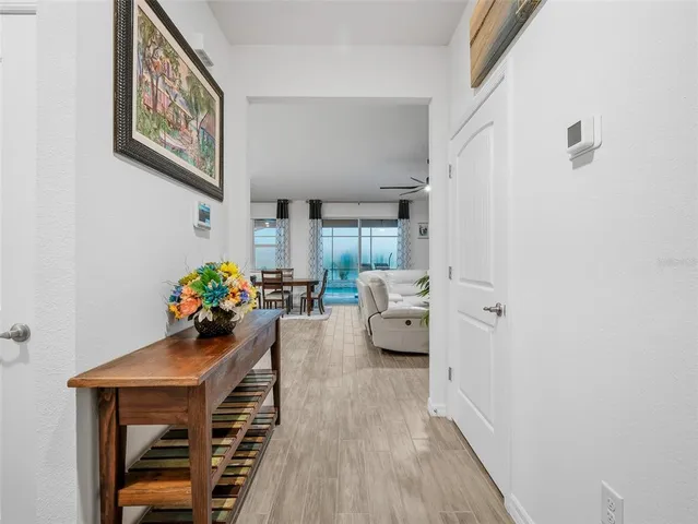 a bathroom with a sink toilet vanity and shower