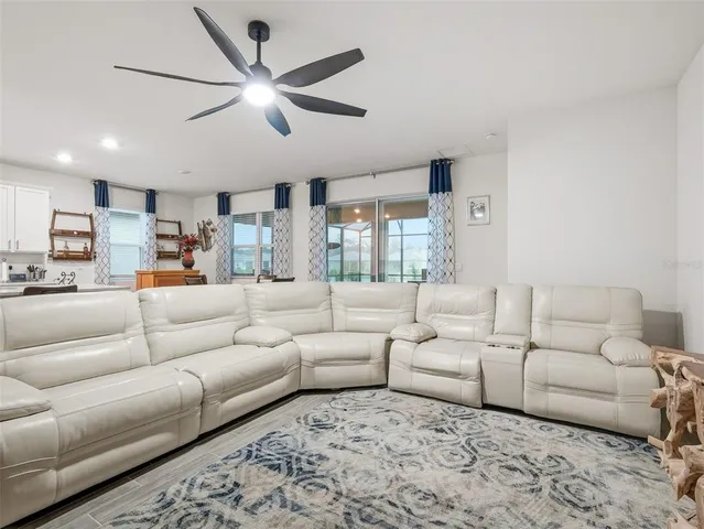 a kitchen with a sink stove and refrigerator