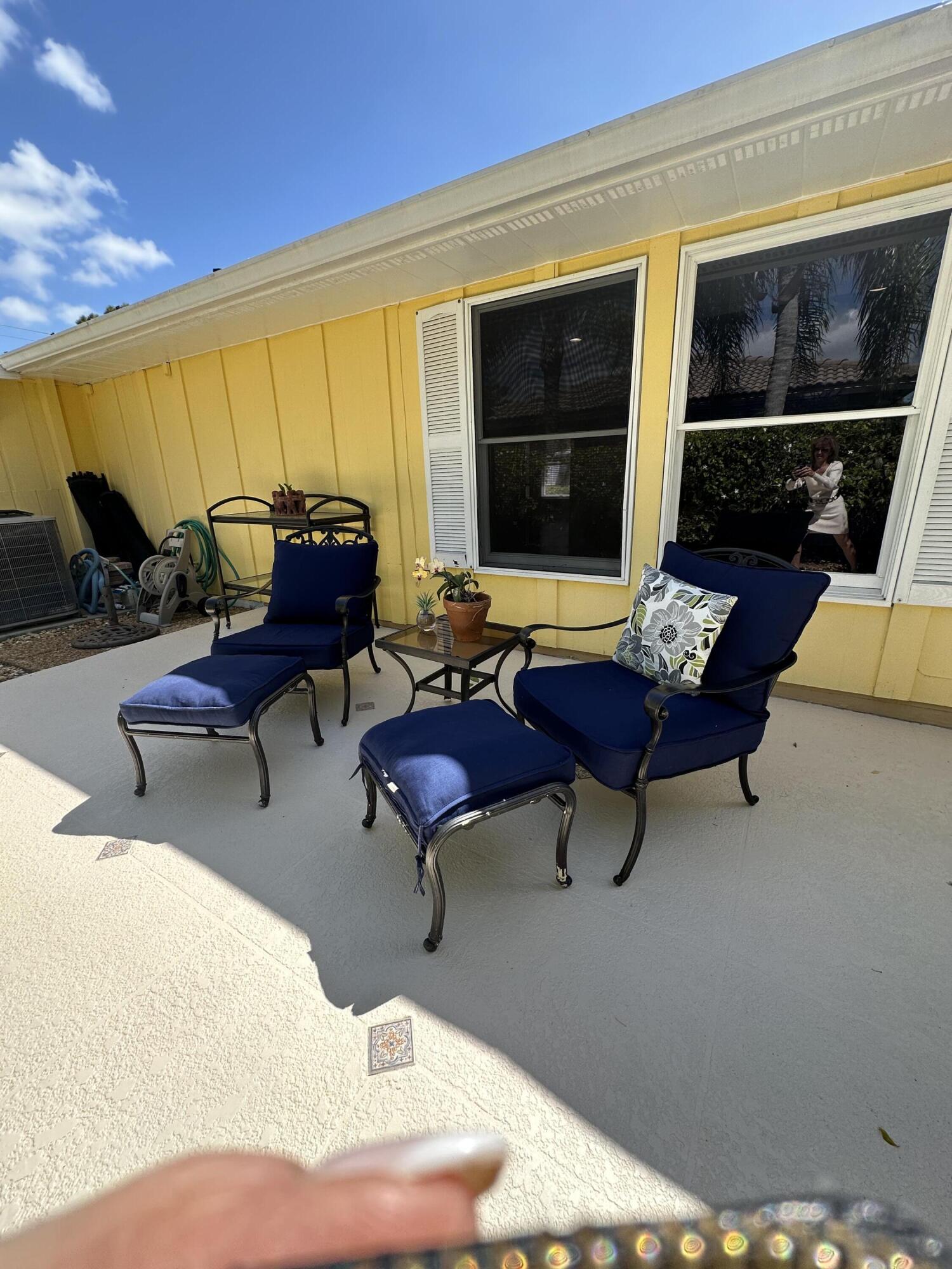 1599 Isabel Este Road Boca Raton, FL 33486 - Photo 27 of 30 SITTING AREA OUTSIDE PRIMARY BEDROOM