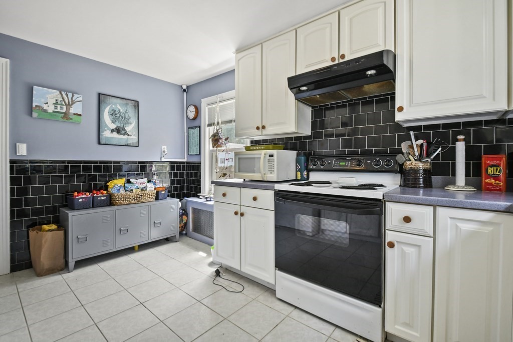 4 Maxdale Road Worcester, MA 01602 - Photo 12 of 28 a kitchen with a cabinets and appliances