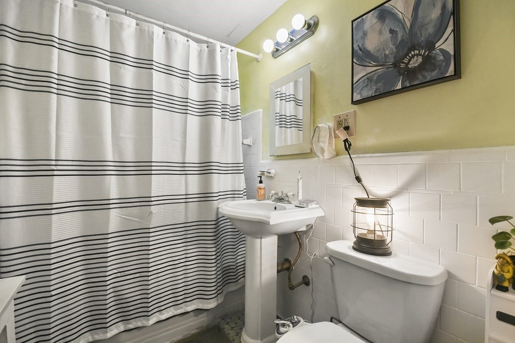 4 Maxdale Road Worcester, MA 01602 - Photo 15 of 28 a bathroom with a sink and a toilet