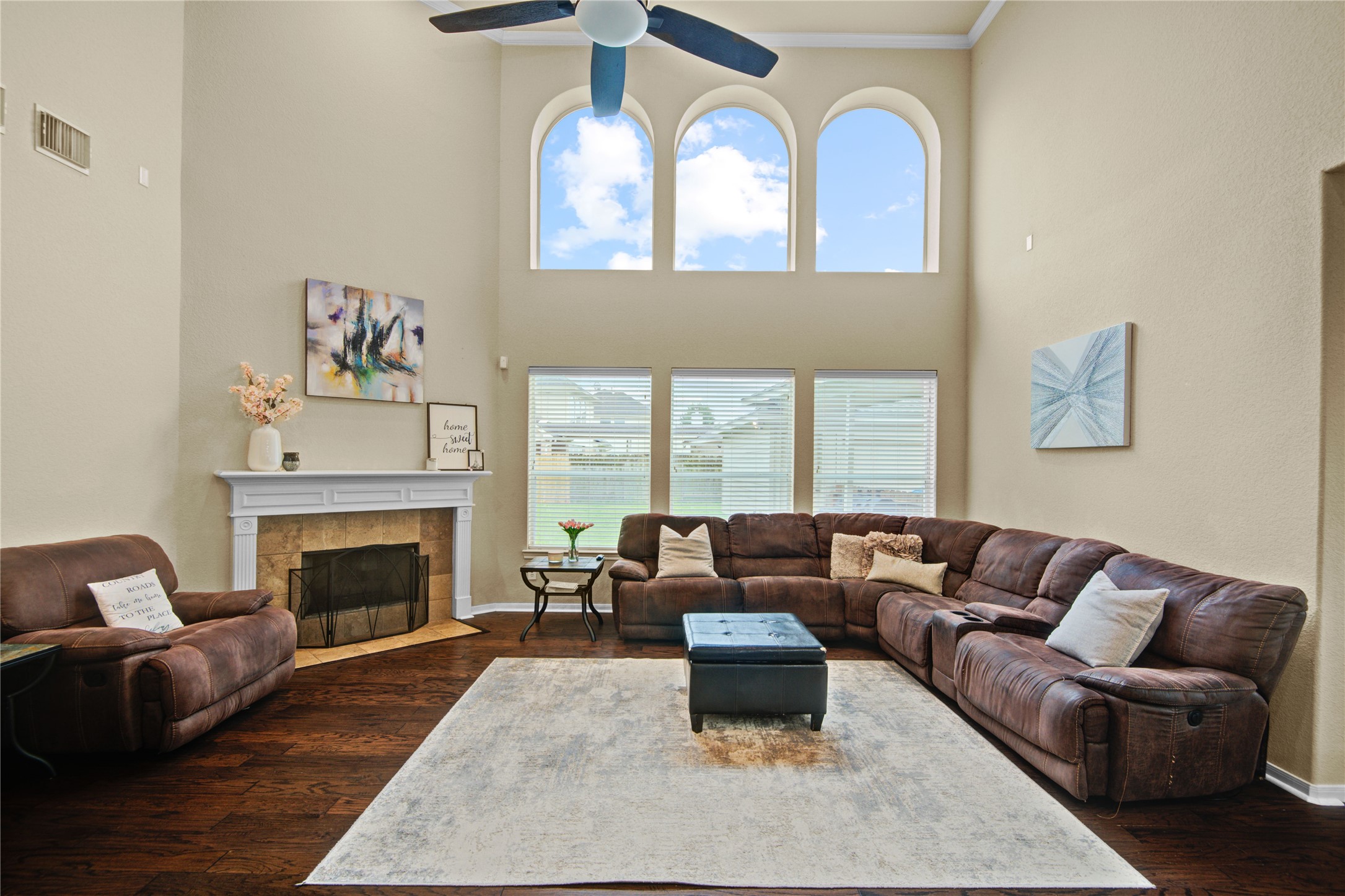 6007 Valhalla Drive Spring, TX 77379 - Photo 15 of 37 A wall of windows and elevated ceilings create a bright, airy family room perfect for gathering and entertaining.