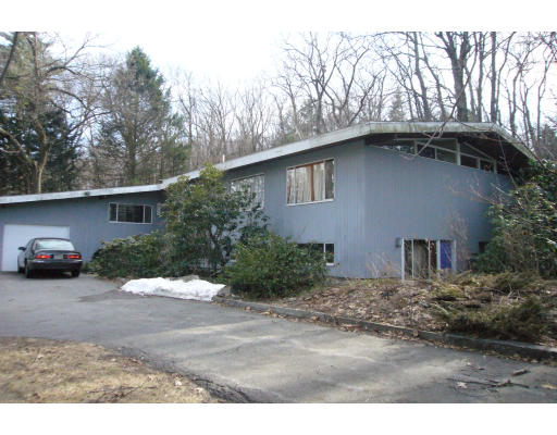 8 Baskin Road Lexington, MA 02421 - Photo 1 of 15 a house view with a outdoor space