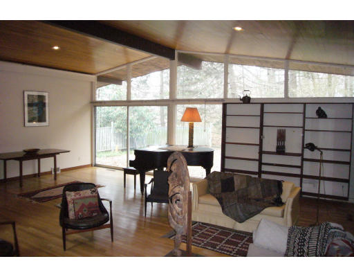8 Baskin Road Lexington, MA 02421 - Photo 5 of 15 a dining room with furniture and wooden floor