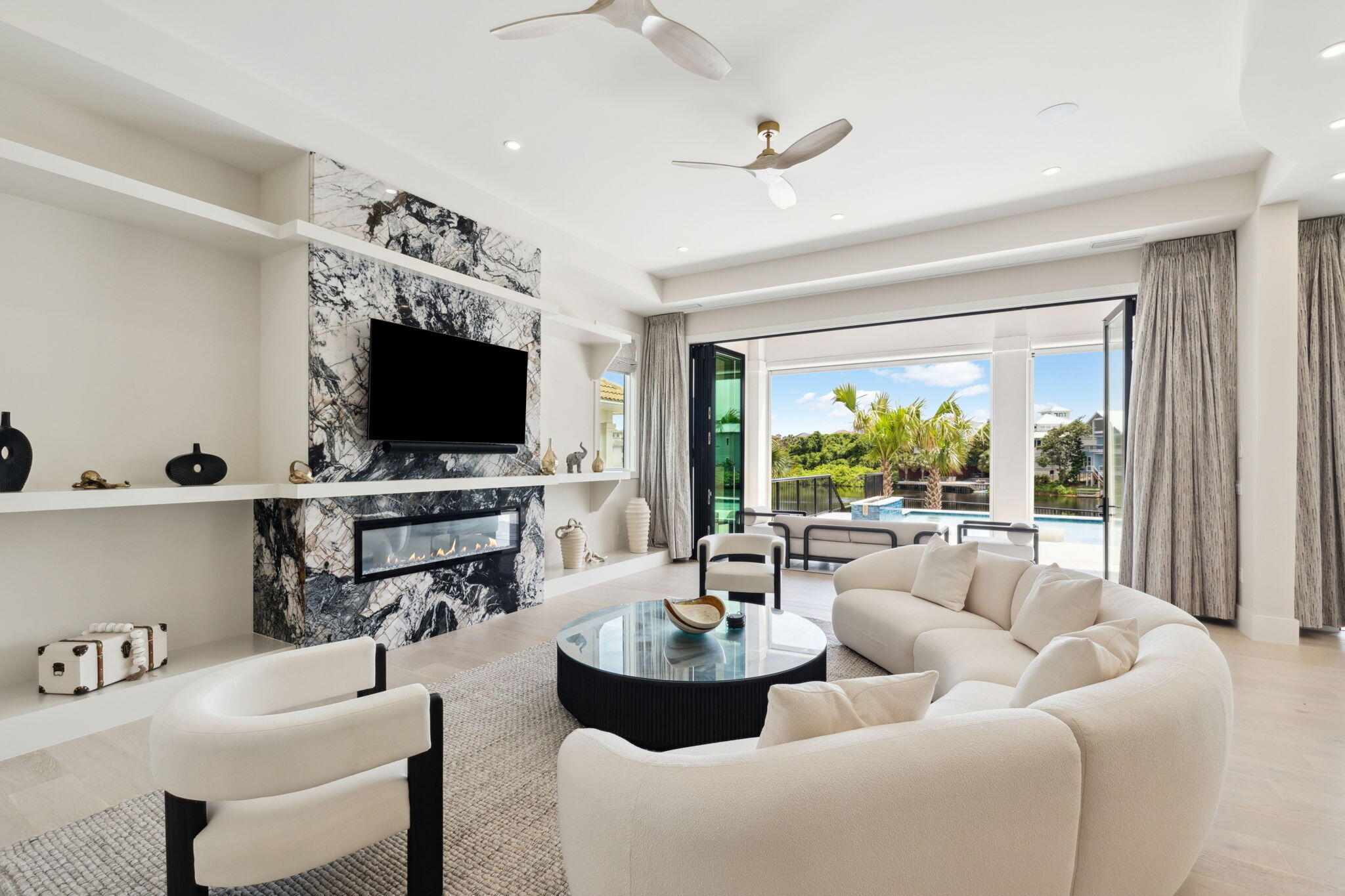 92 Southern Cross Ln Inlet Beach Inlet Beach, FL 32461 - Photo 5 of 19 a living room with furniture a flat screen tv and a large window